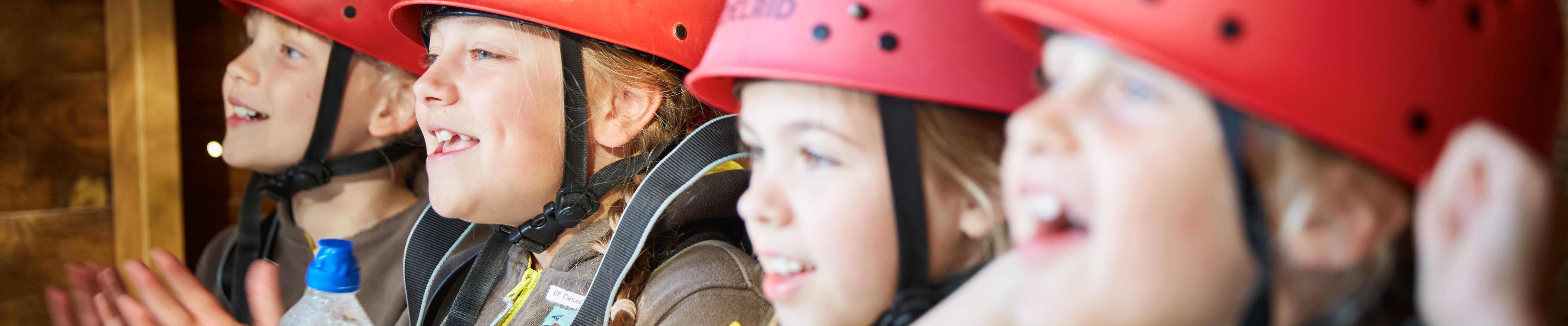 Girls in helmets cheering